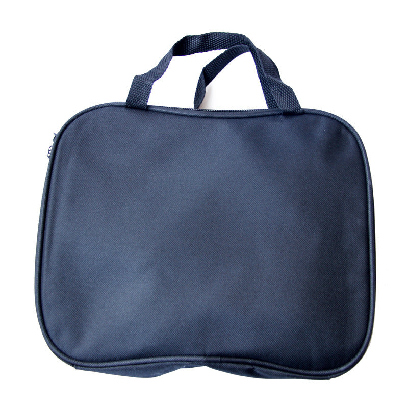Navy blue Pet grooming bag with a handle on a white background