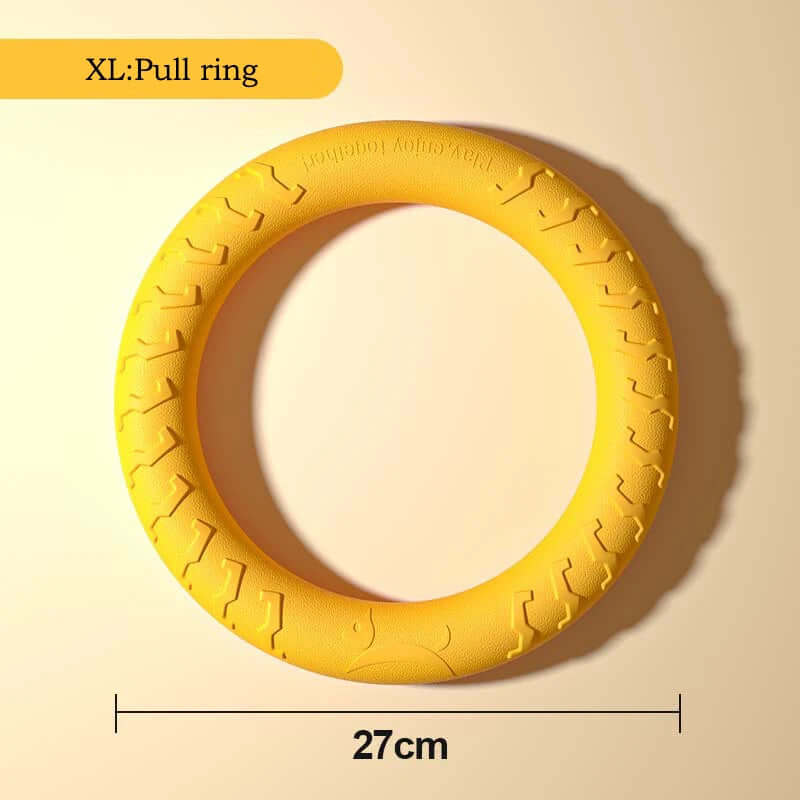 Yellow pull ring toy with measurement label on a beige background