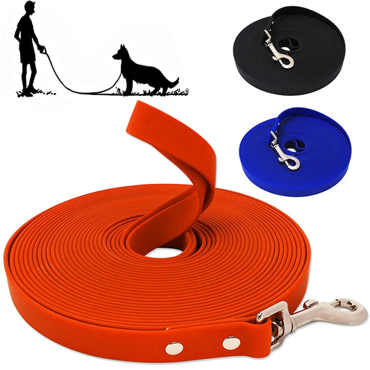 Orange dog leash with metal clip, black leash with metal clip, and blue leash with metal clip on a white background.