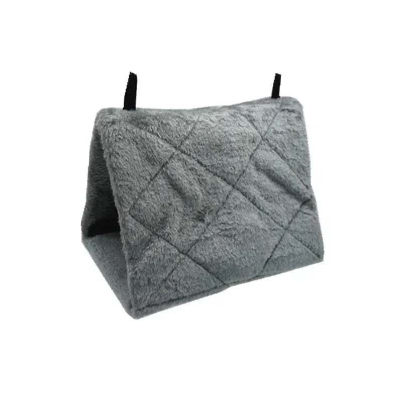 Gray pet hammock with quilted design on a white background