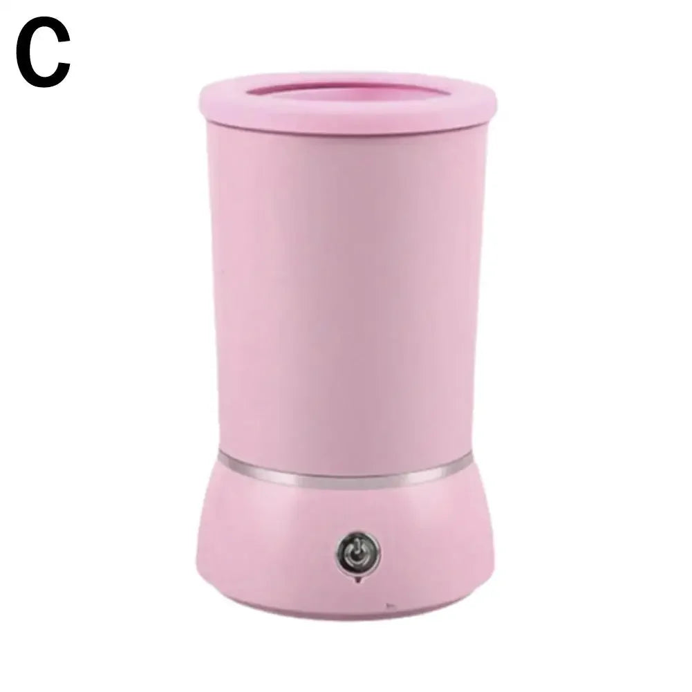 Pink humidifier on a white background