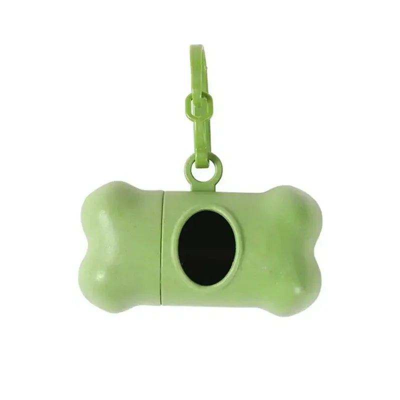 Green bone-shaped pet toy with a black center on a white background