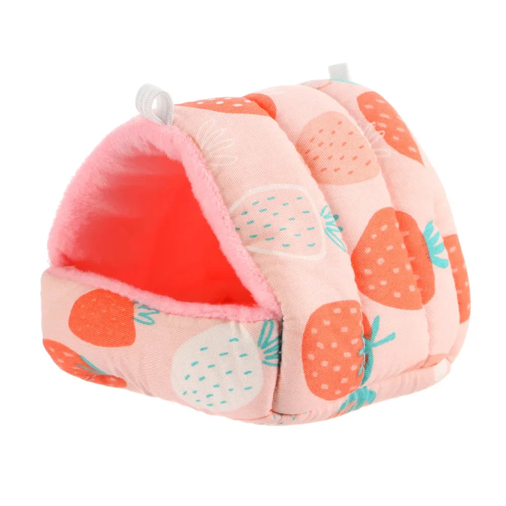 Pink pet house with strawberry pattern on a white background