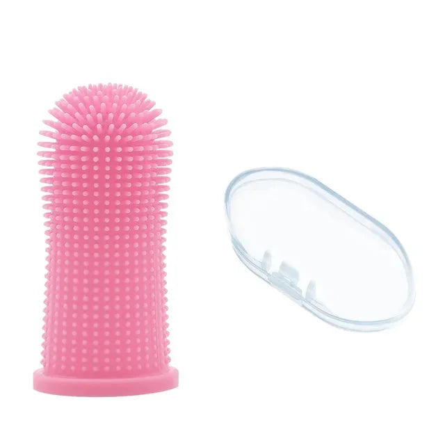 Pink silicone brush with clear cover on a white background