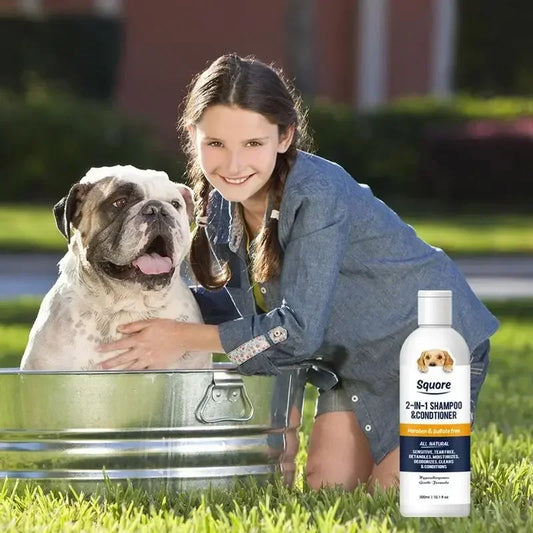 Girl with a dog next to a metal bath tub and a bottle of Squore shampoo conditioner.