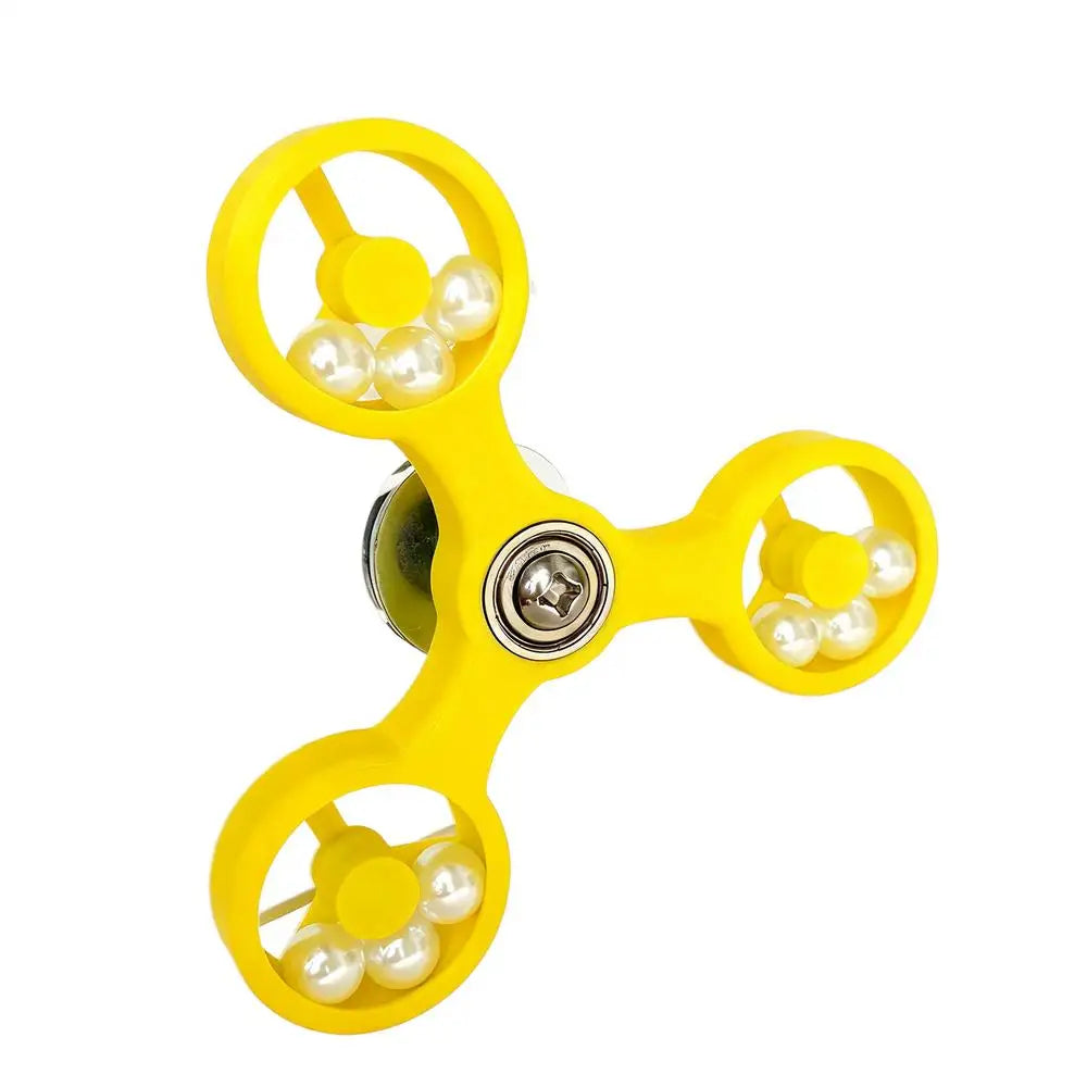 Yellow fidget spinner on a white background