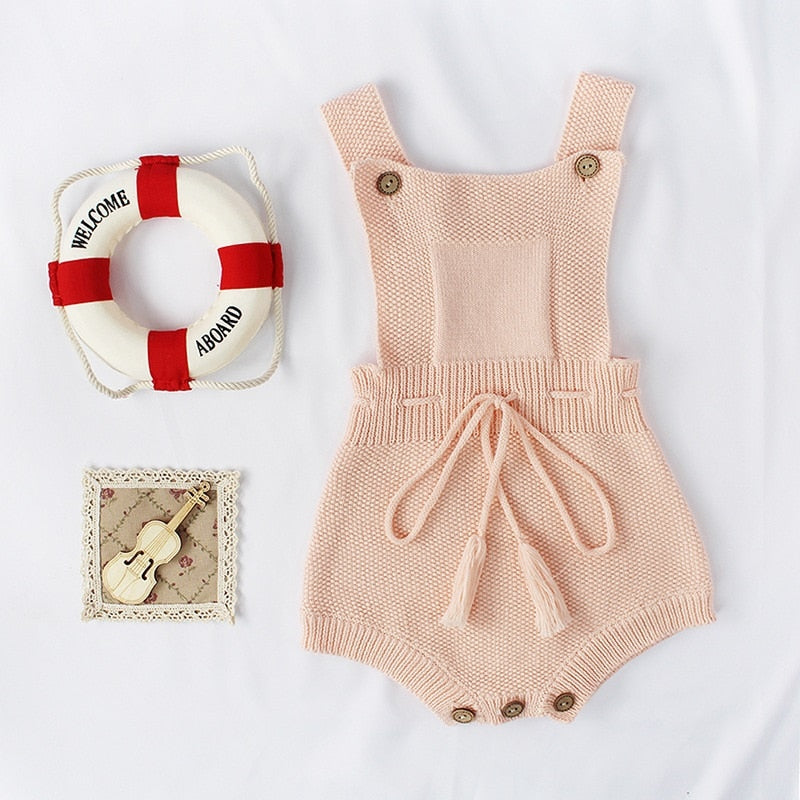 Knitted woolen jumpsuit for babies and toddlers