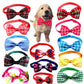 Dog wearing a red plaid bow tie with various colorful bow ties displayed around it on a white background.