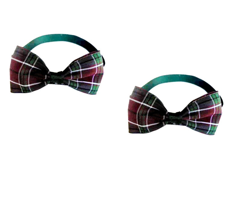 Two plaid bow ties on a white background