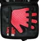 Pet grooming tool set with a glove in an open case on a black background.