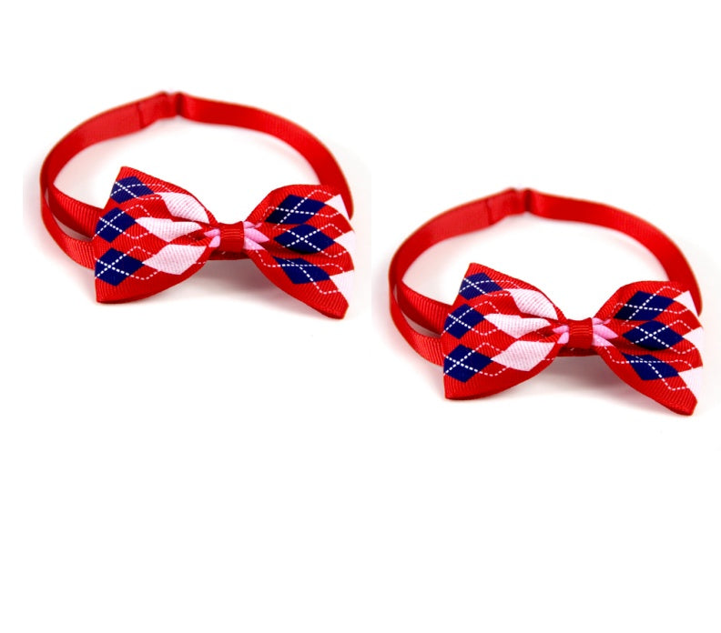 Two red and blue checkered bow ties on white background