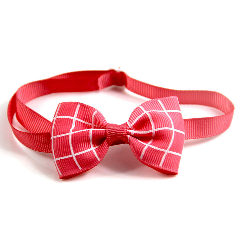 Red plaid bow tie on a white background