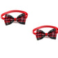 Two red and black plaid bow ties on a white background