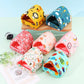 Colorful pet houses with animal patterns on a light green background
