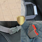 Collage of car seat belt components including padding, buckle, and clip.