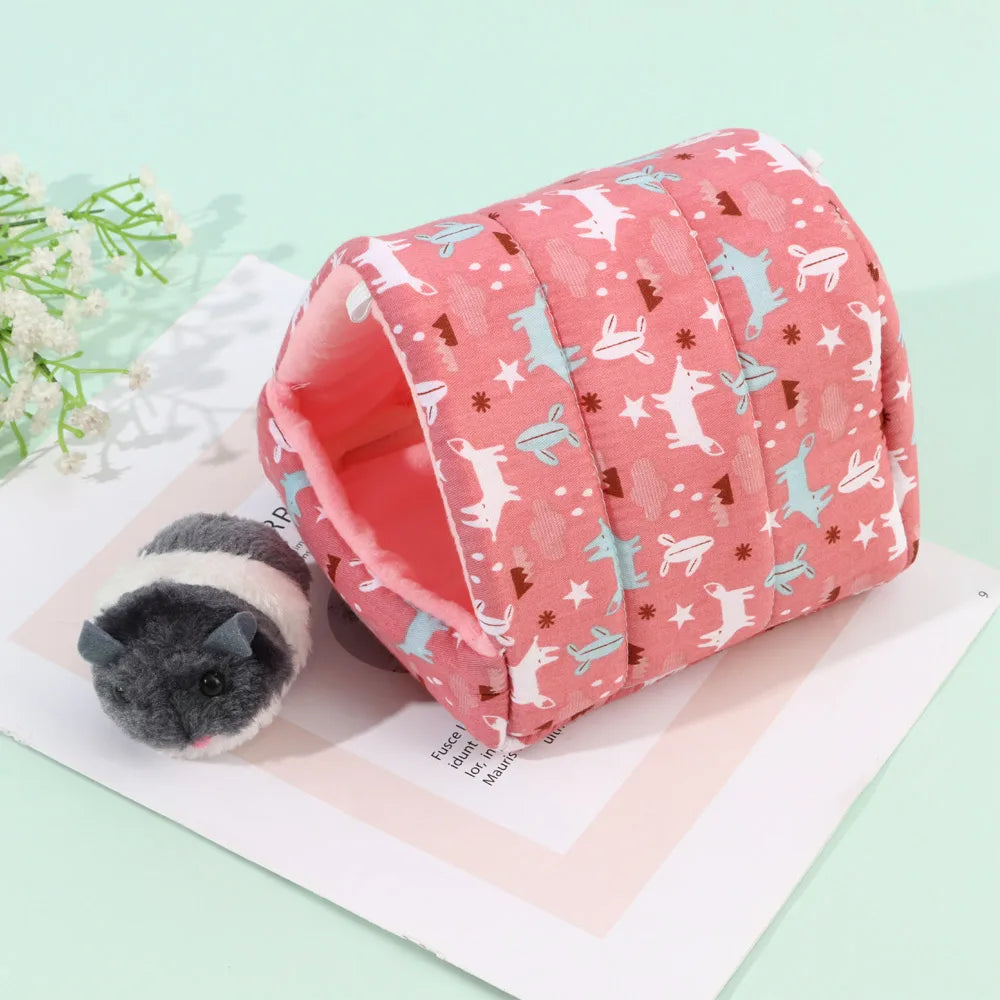 Pink pet tunnel with animal pattern on a light green background