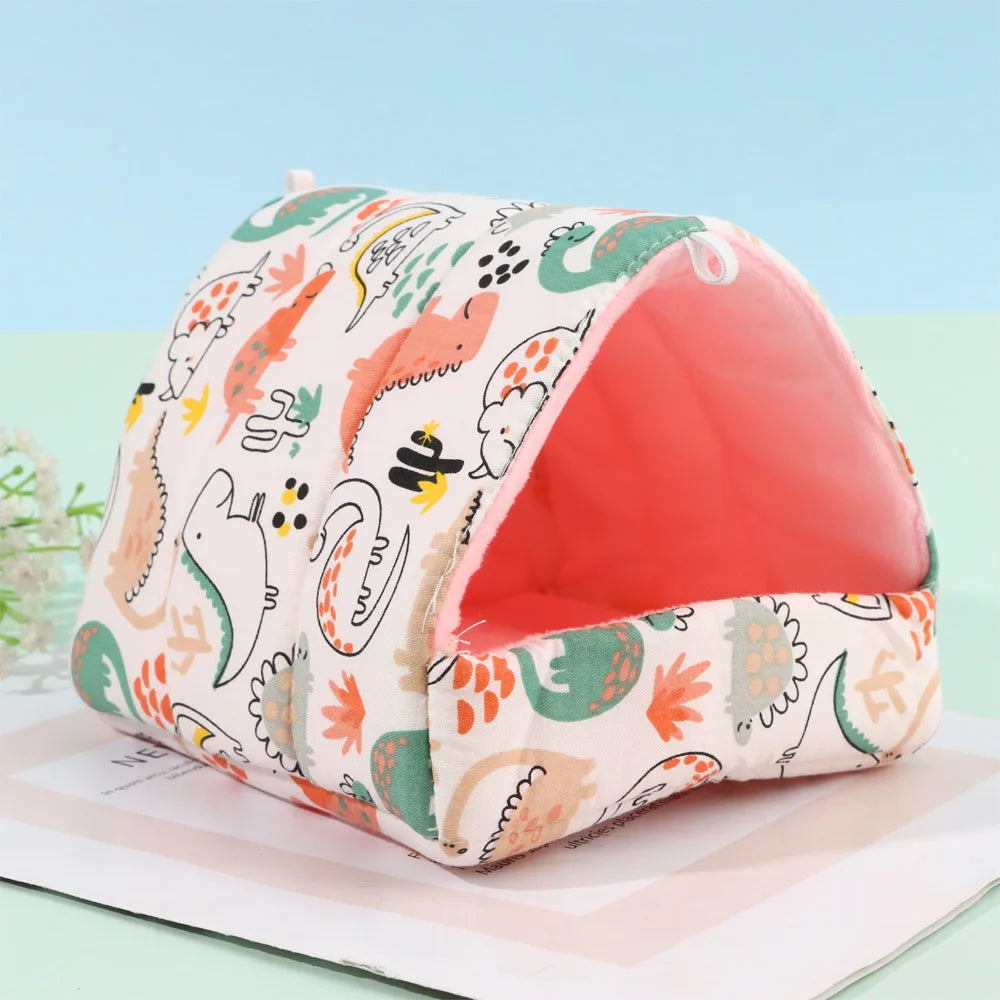 Pet bed with dinosaur pattern on a light blue background