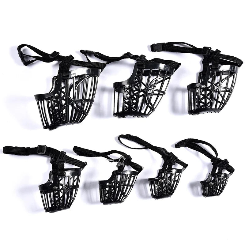 Set of black dog muzzle with straps on a white background