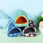 Three colorful pet beds with animal prints on a light green surface.