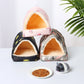 Three pet houses with a small plate of food and a toy on a white surface.