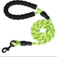 Neon green dog leash with black handles on a white background
