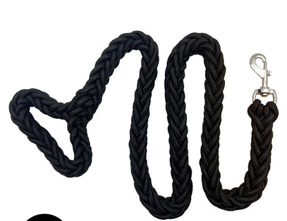 Black braided dog leash with metal clip on a white background