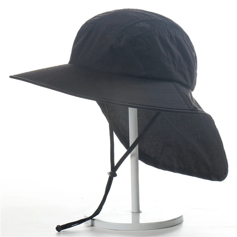 Black wide-brimmed hat with neck flap on a stand against a white background