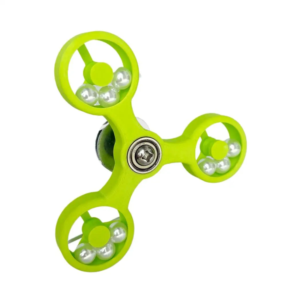 Green fidget spinner on a white background