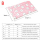 Pink pet bed with white dog pattern and size chart below