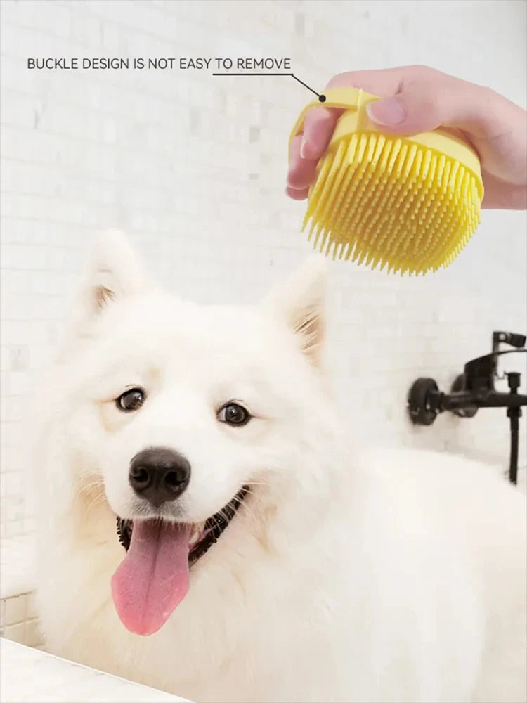 White dog being bathed with a yellow pet grooming brush, with text indicating the buckle design is not easy to remove.