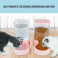 Two cats using an automatic pet feeder and water dispenser on a wooden floor.