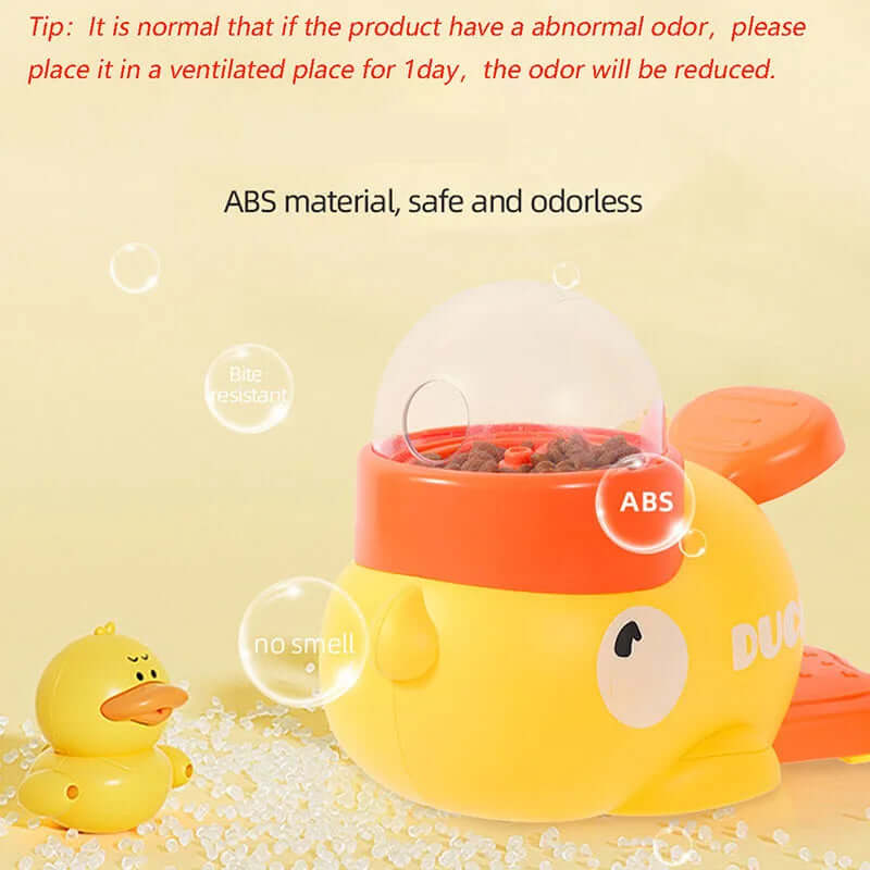Yellow duck-shaped pet food container with text about ABS material on a yellow background