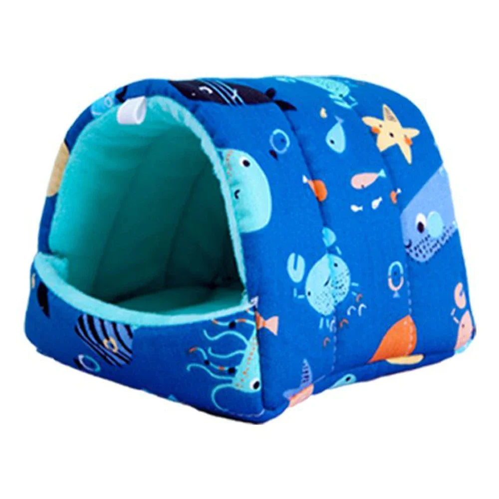 Blue pet bed with ocean-themed design on a white background