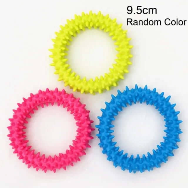 Three colorful spiky rubber bands on a white background with text indicating size and color randomness.