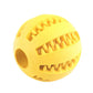 Yellow rubber ball with textured surface on a white background