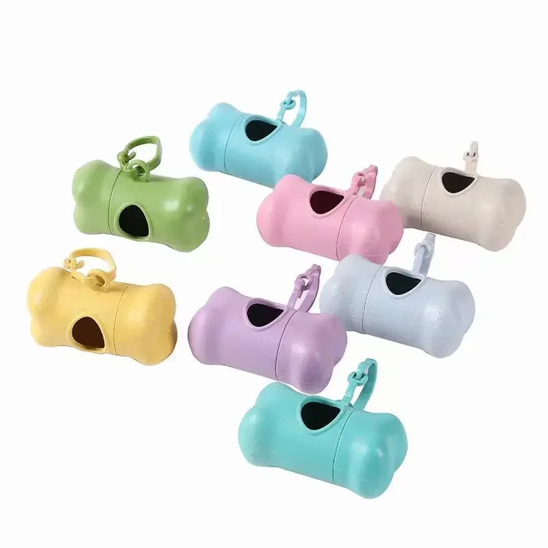 Set of colorful pet waste bags dispensers on a white background