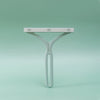 Squeegee on a solid green background