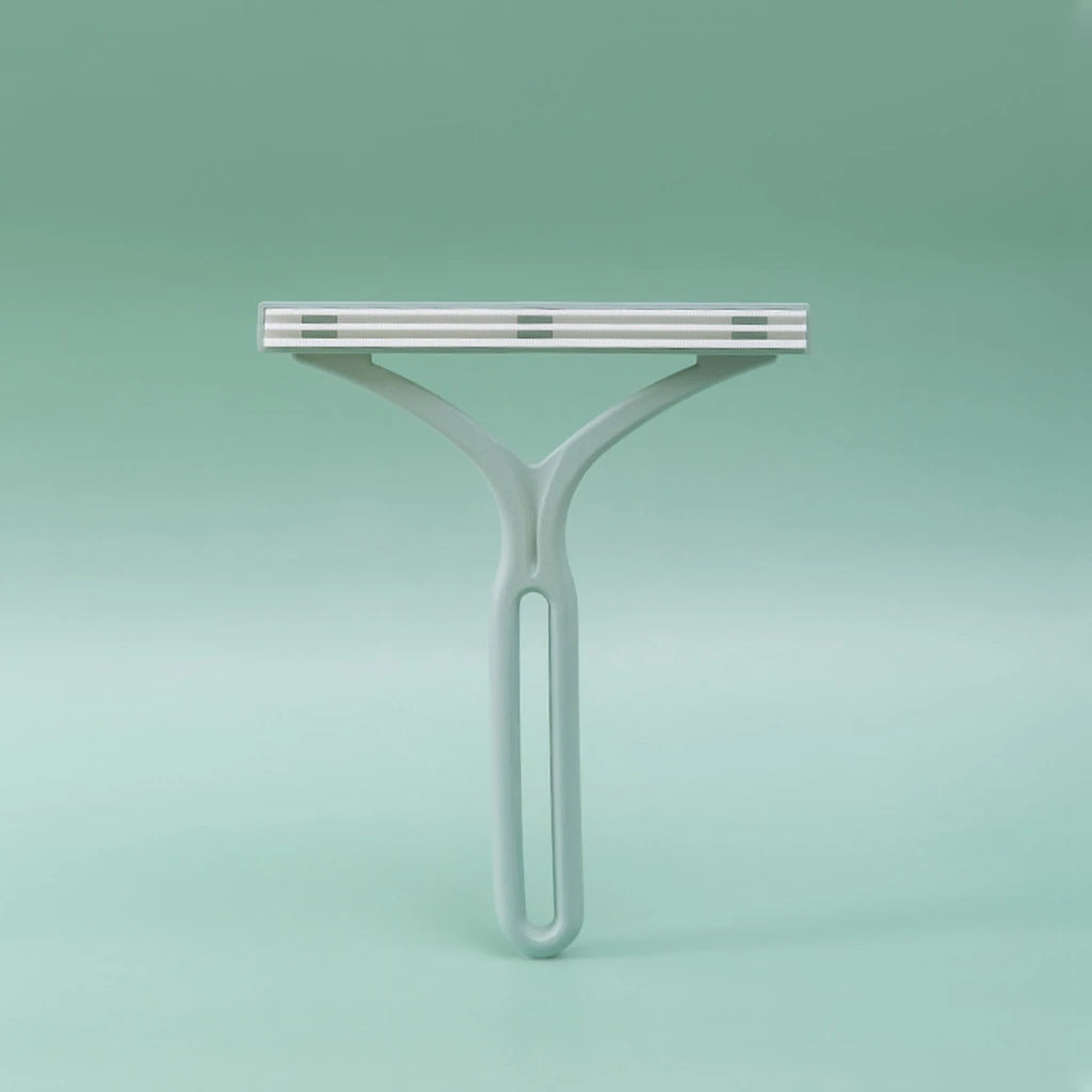Squeegee on a solid green background