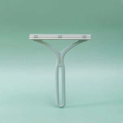 Squeegee on a solid green background