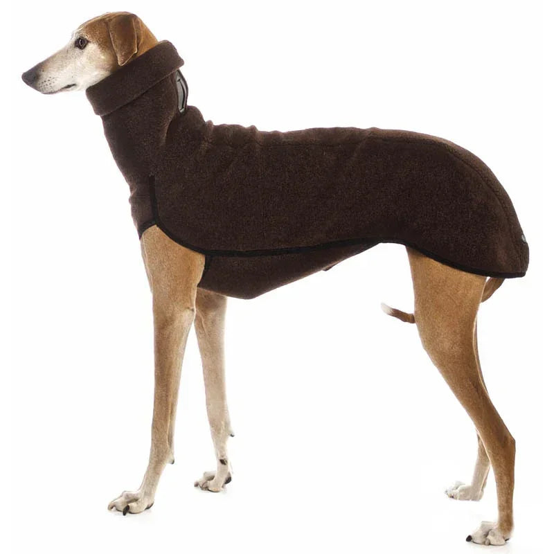 Dog wearing a brown fleece coat on a white background