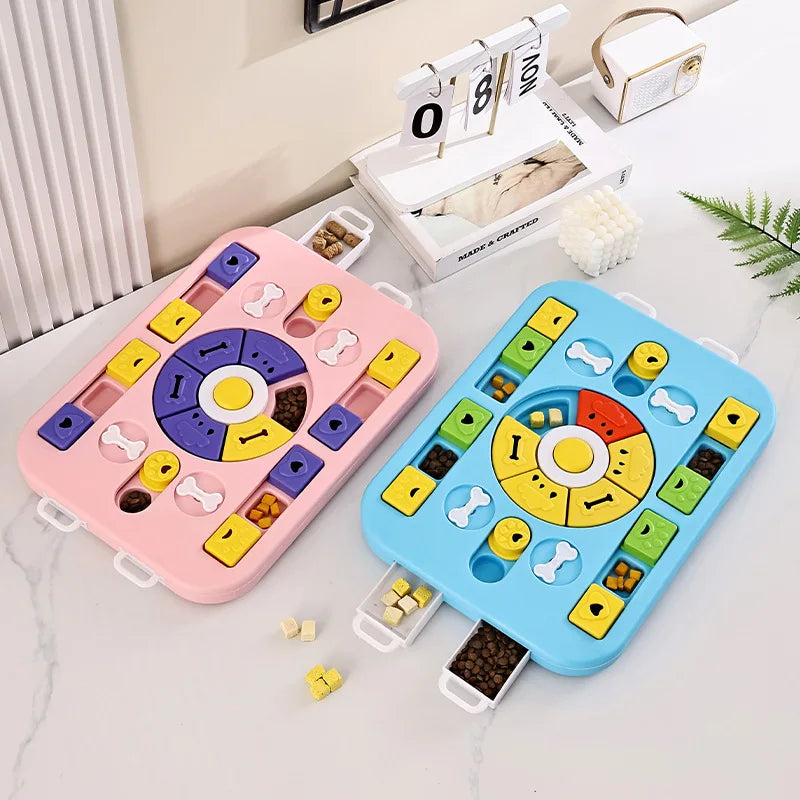 Two colorful puzzle toys on a light surface with a calendar and plant in the background.