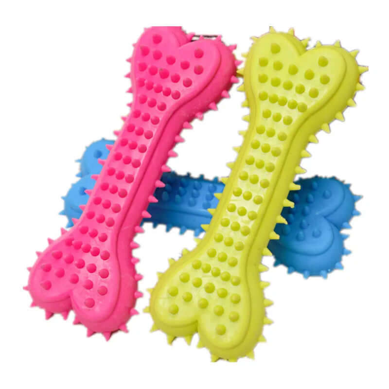 Colorful dog toys with textured surfaces on a white background