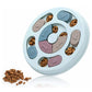 Pet puzzle toy with compartments filled with kibble on a white background