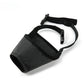 Black dog muzzle with a strap on a white background