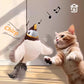 Cat playing with a bird-shaped toy with musical notes and 'Chirp' text.