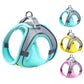 Pet harnesses in teal, yellow, and pink on a white background