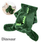 Green dinosaur costume for pets with a small dog wearing it in the corner.