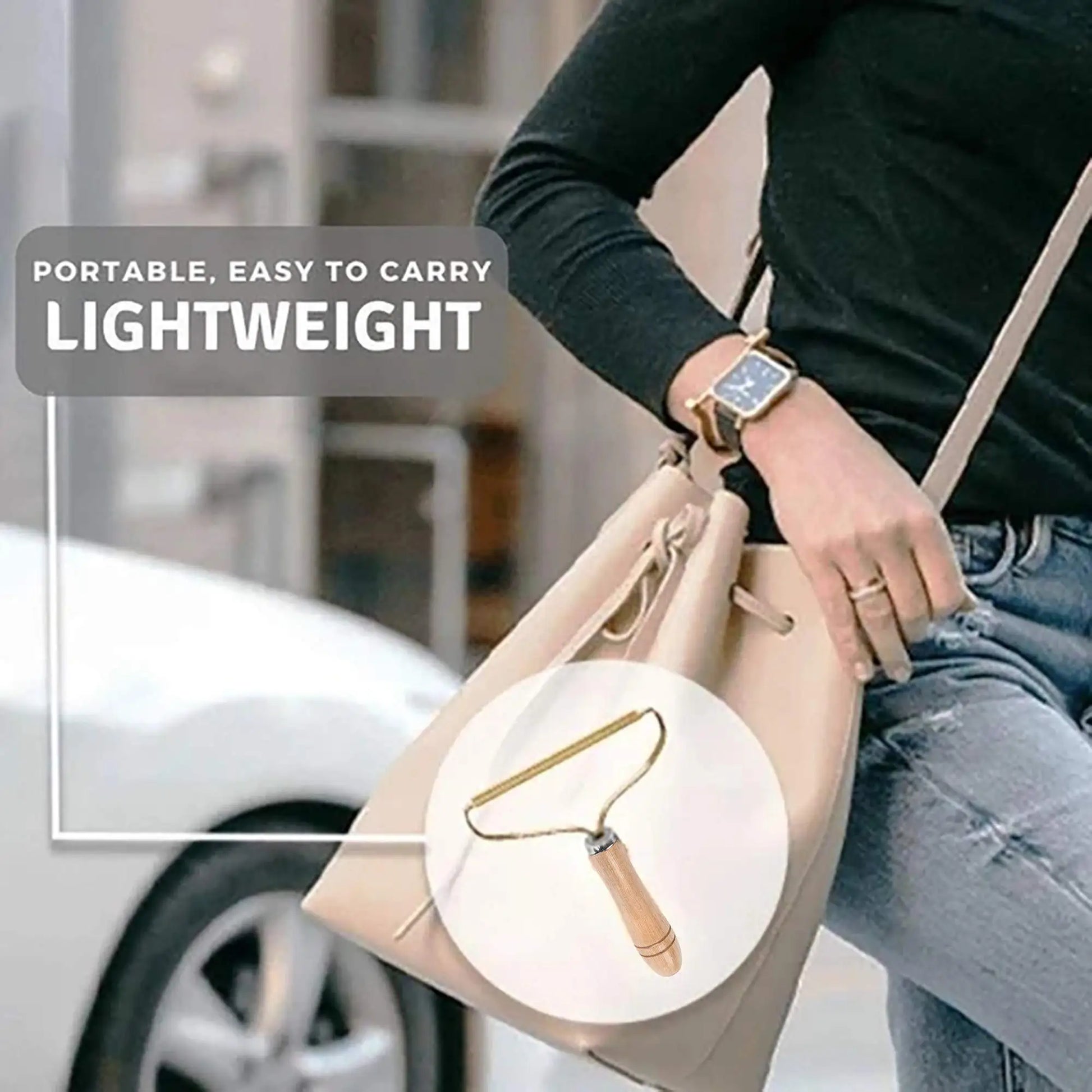 Person holding a beige handbag with a close-up of a keychain, text 'Portable, Easy to Carry, Lightweight' on a blurred background.