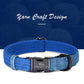 Blue dog collar with a black buckle and engraved name and phone number on a blue yarn background.