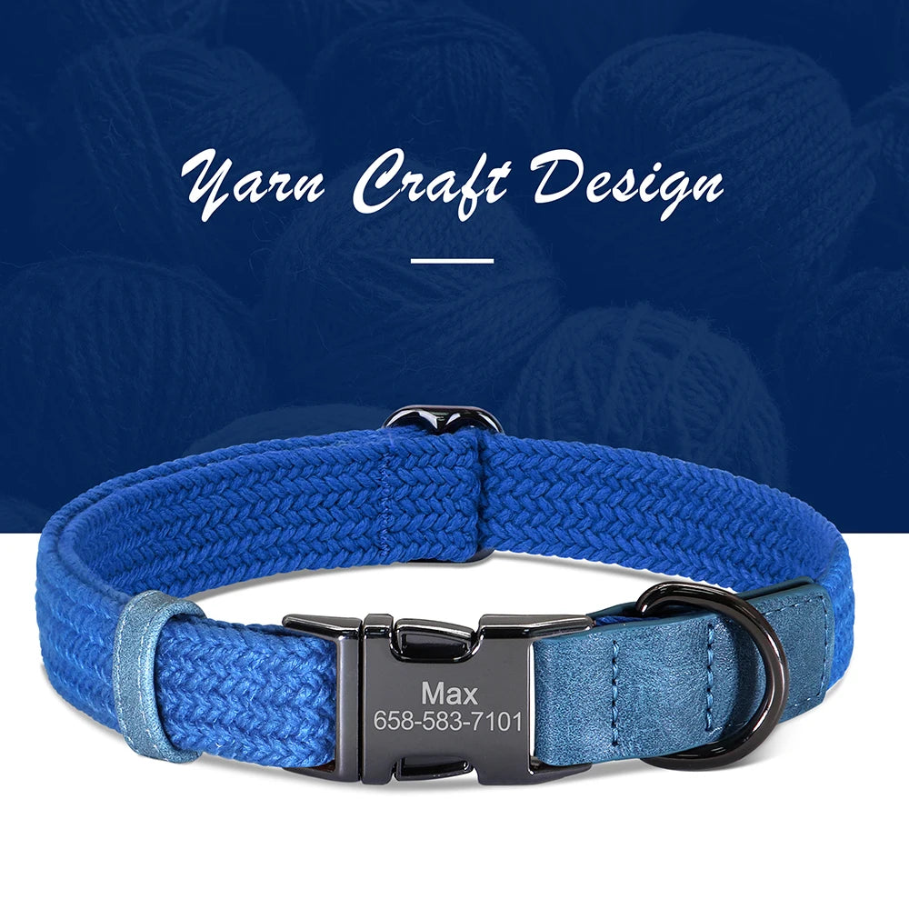 Blue dog collar with a black buckle and engraved name and phone number on a blue yarn background.